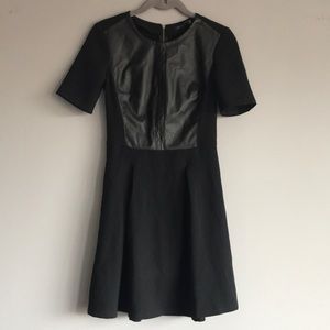 Flared dress with faux leather